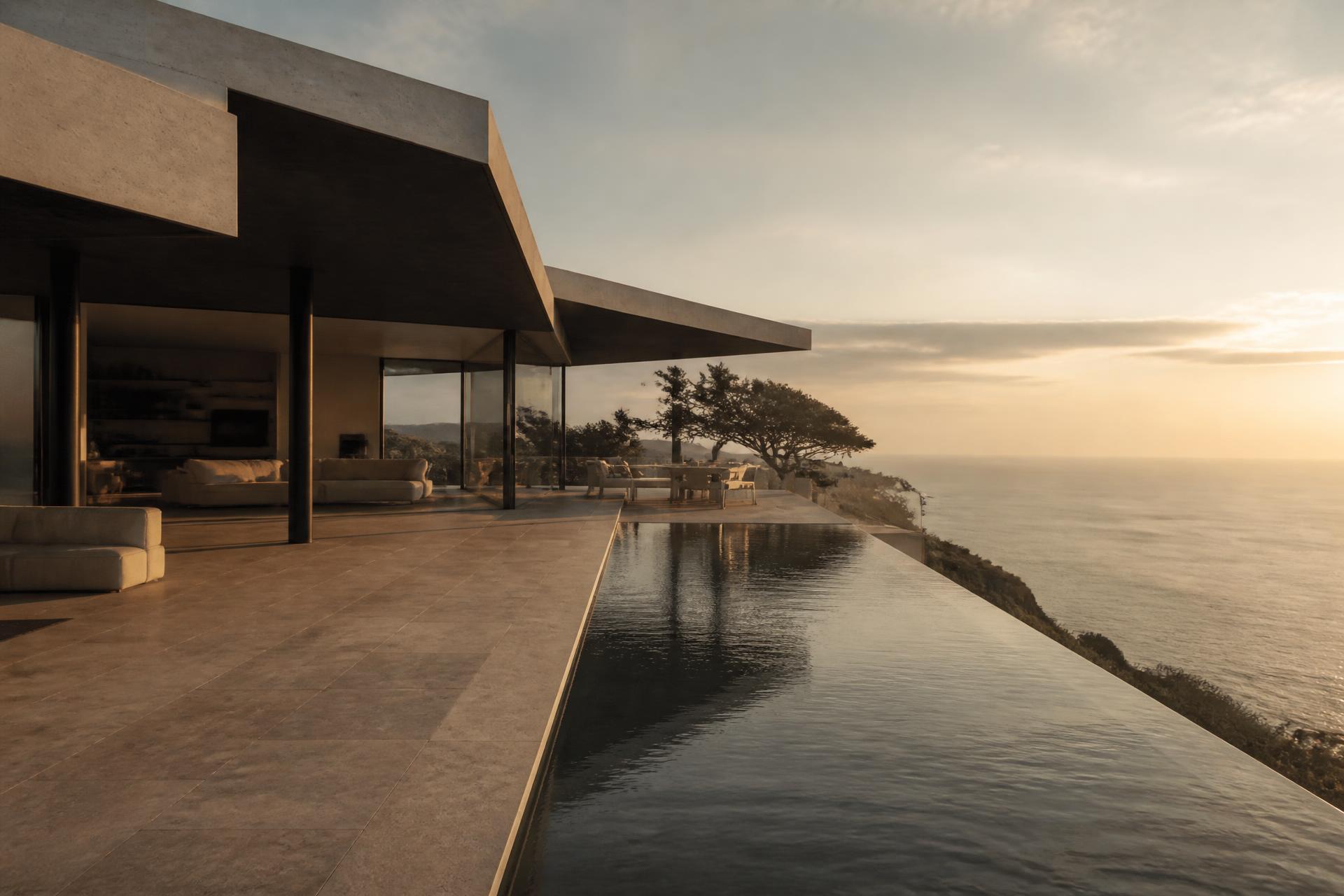 Private Villa mit Infinity-Pool über dem Meer im Abendlicht